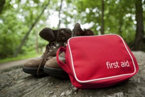 Camping first aid kit on boots